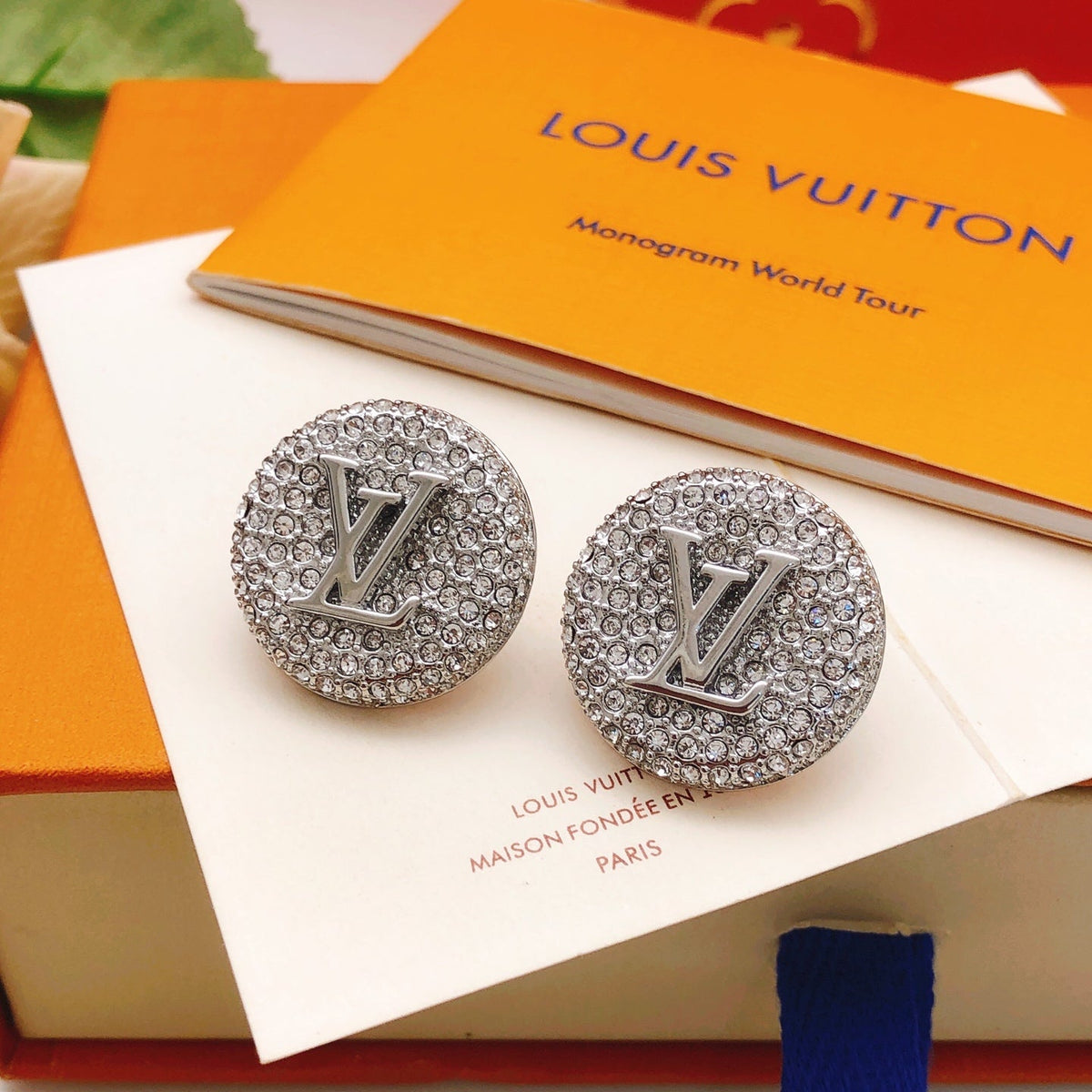 Martin Graham stud earrings in polished metal-tone – detail view
