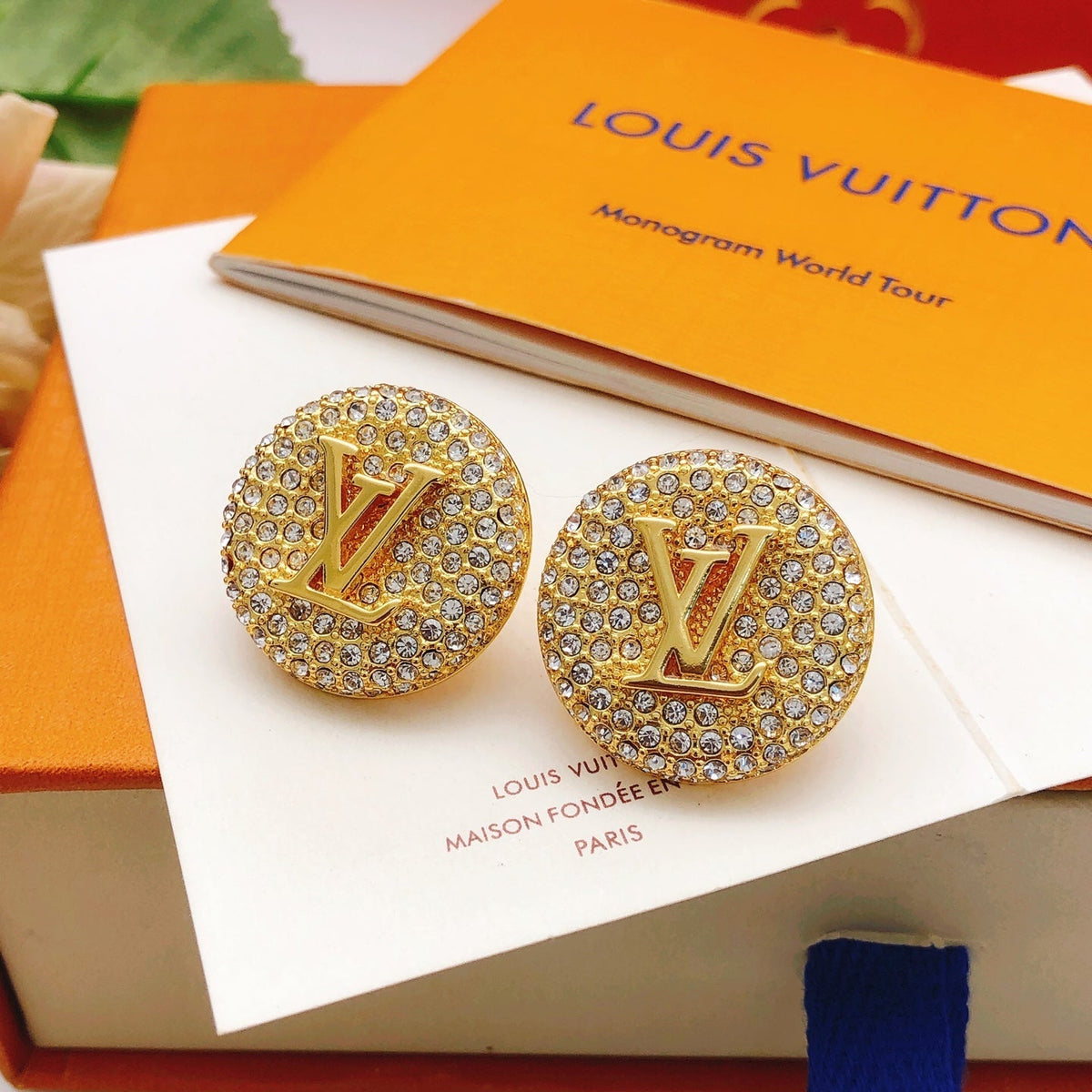 Martin Graham stud earrings in polished metal-tone – detail view