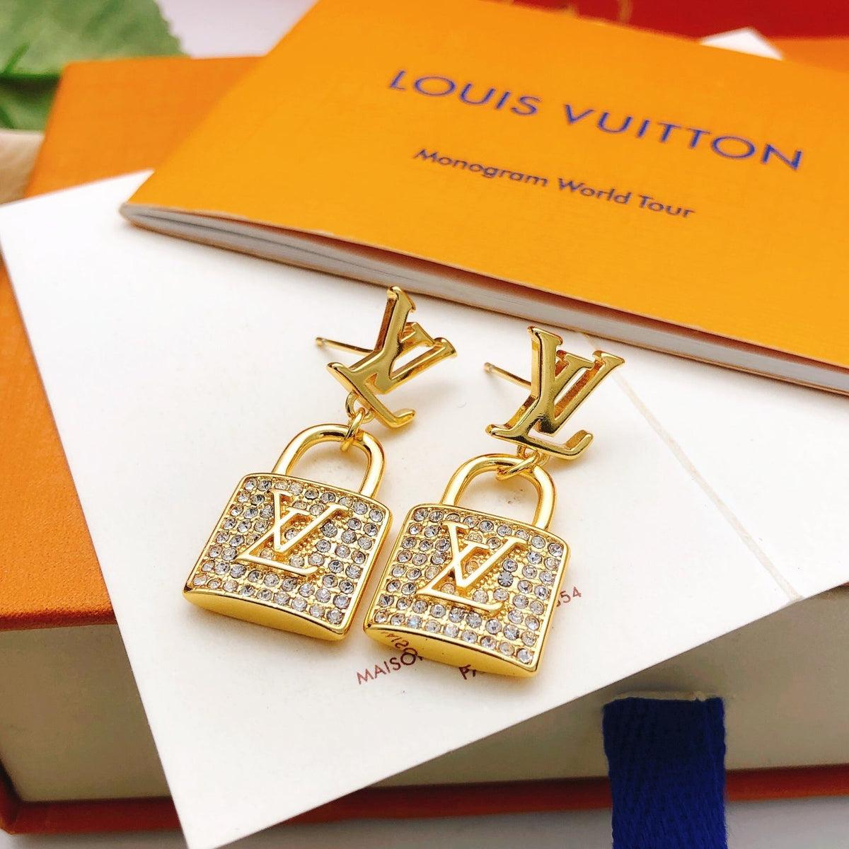 Martin Graham stud earrings in polished metal-tone – front product view