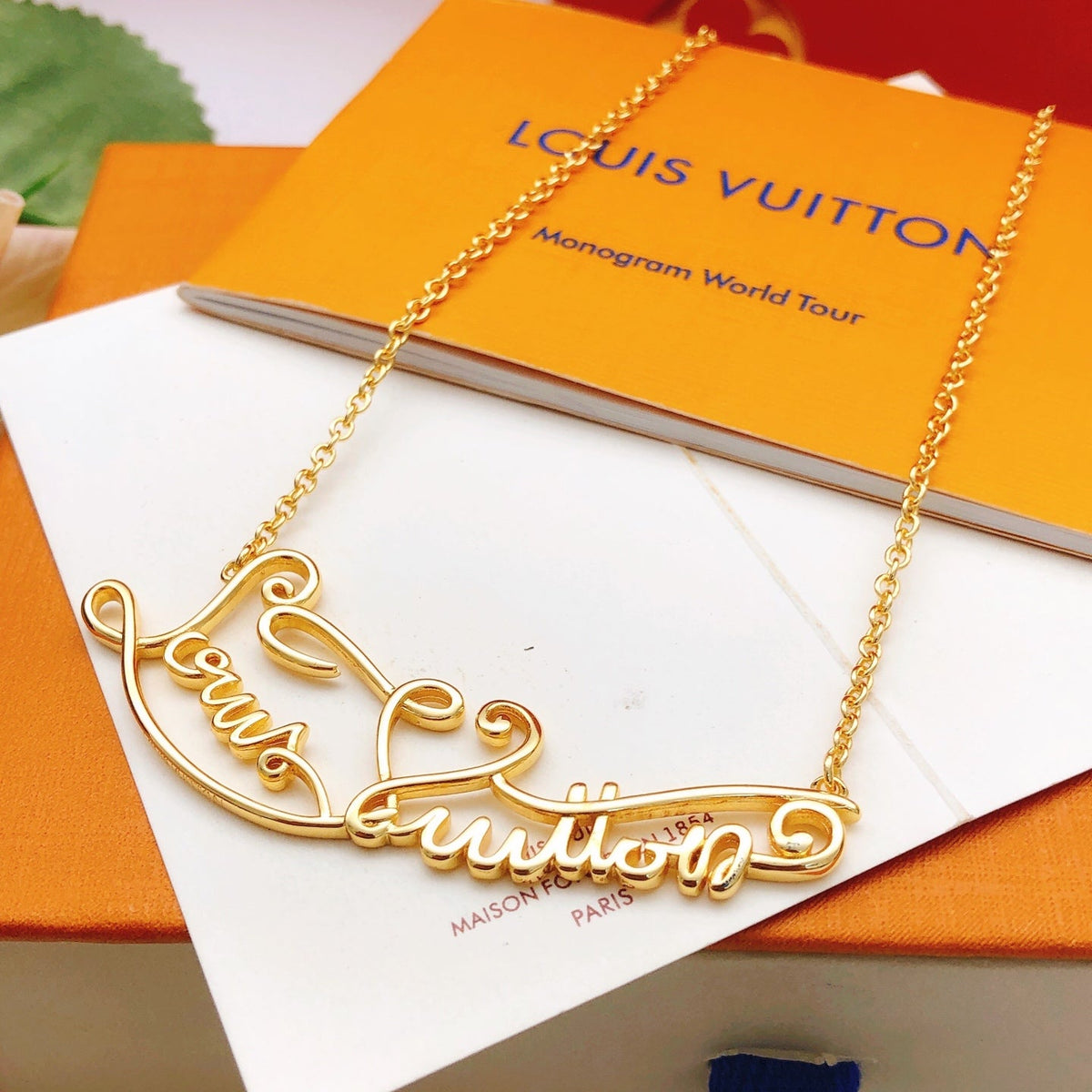 Martin Graham pendant necklace in polished metal-tone – detail view