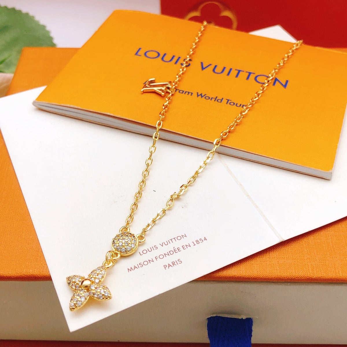 Martin Graham pendant necklace in polished metal-tone – side detail