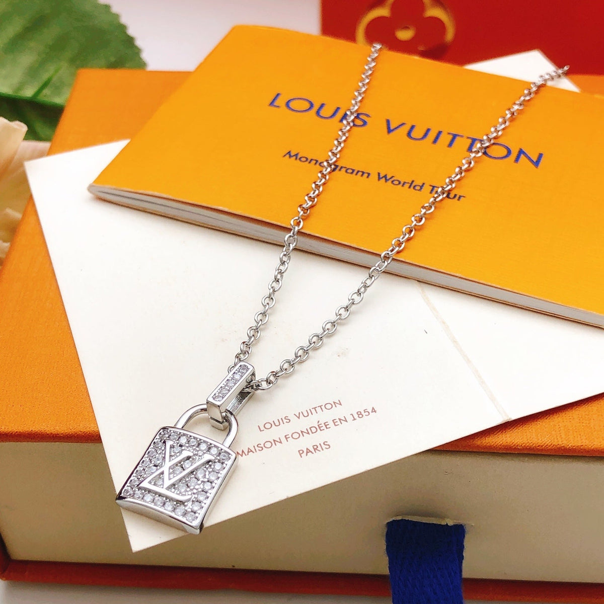 Martin Graham pendant necklace in polished metal-tone – side detail