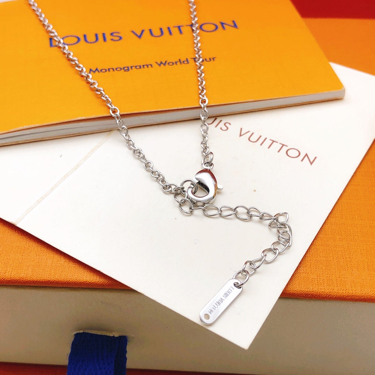 Martin Graham pendant necklace in polished metal-tone – detail view