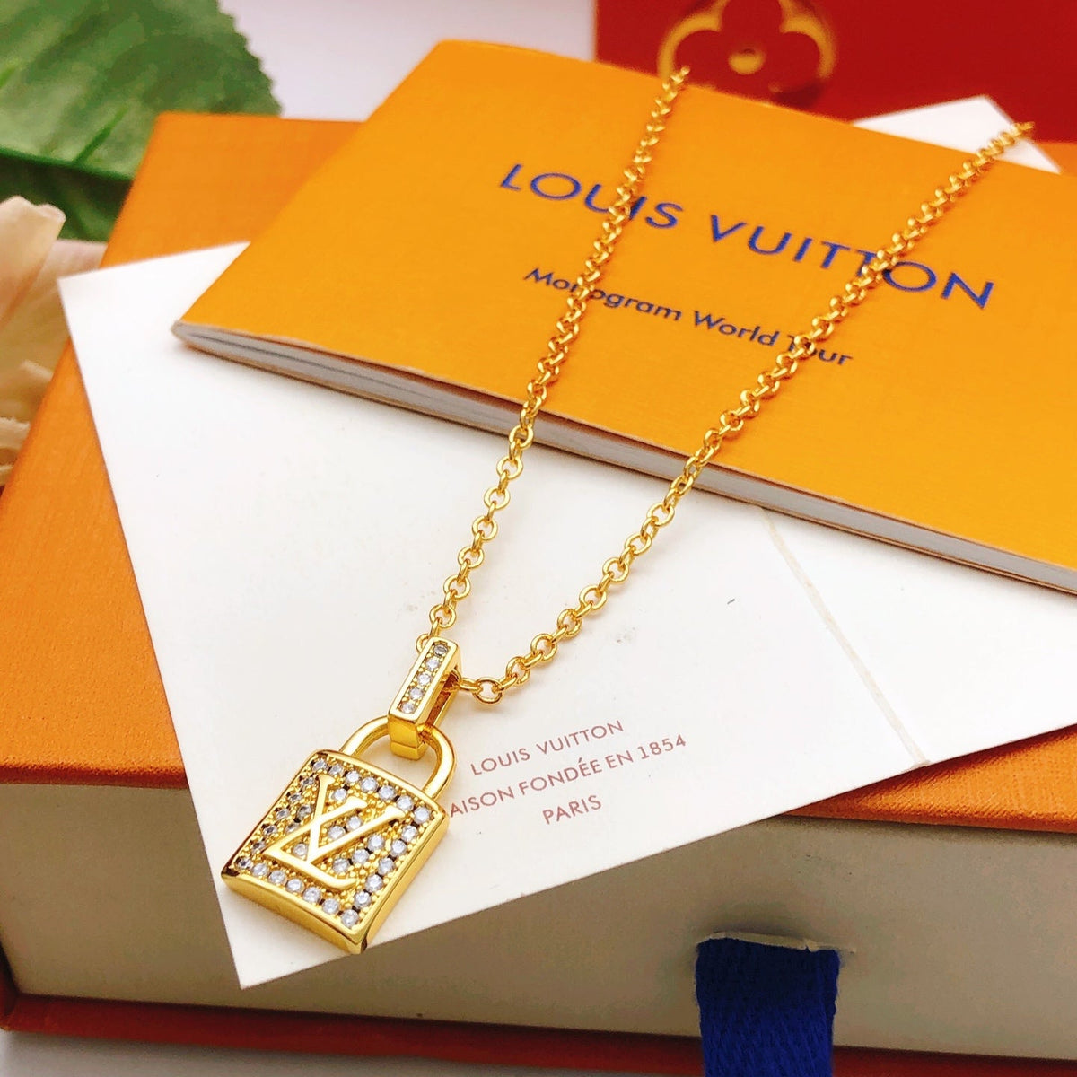 Martin Graham pendant necklace in polished metal-tone – side detail