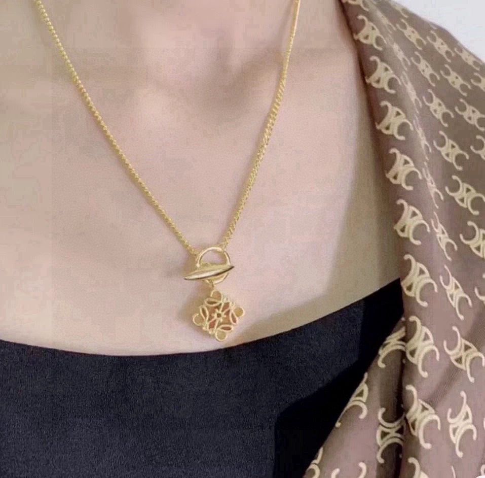 Martin Graham pendant necklace in polished metal-tone – detail view
