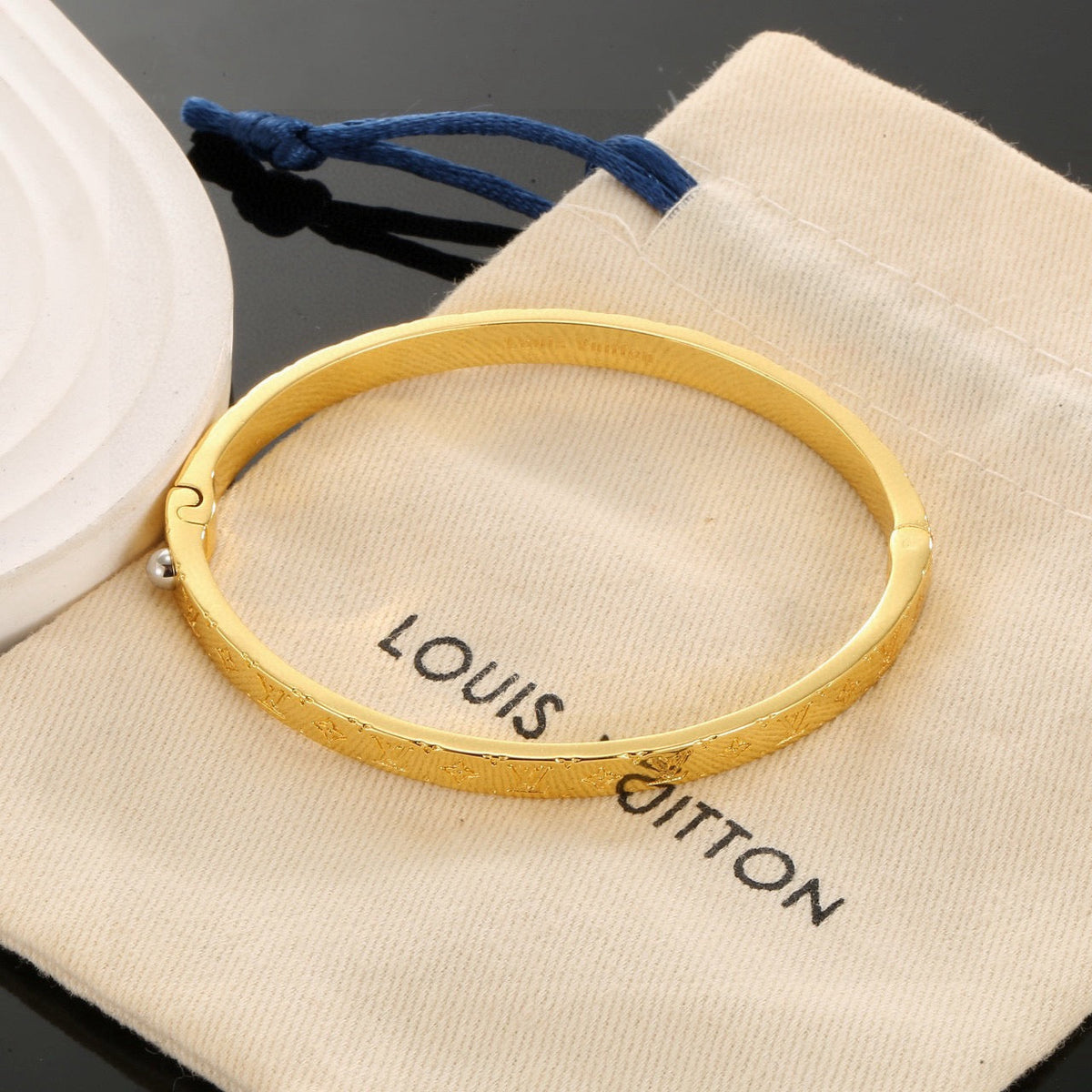 Martin Graham bangle in polished metal-tone – front product view