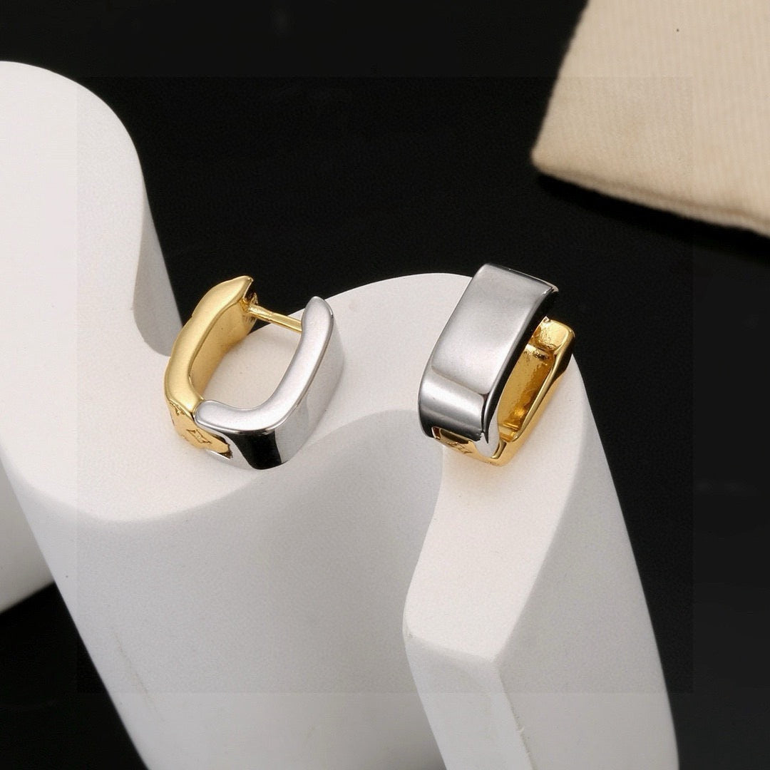 Martin Graham stud earrings in polished metal-tone – front product view