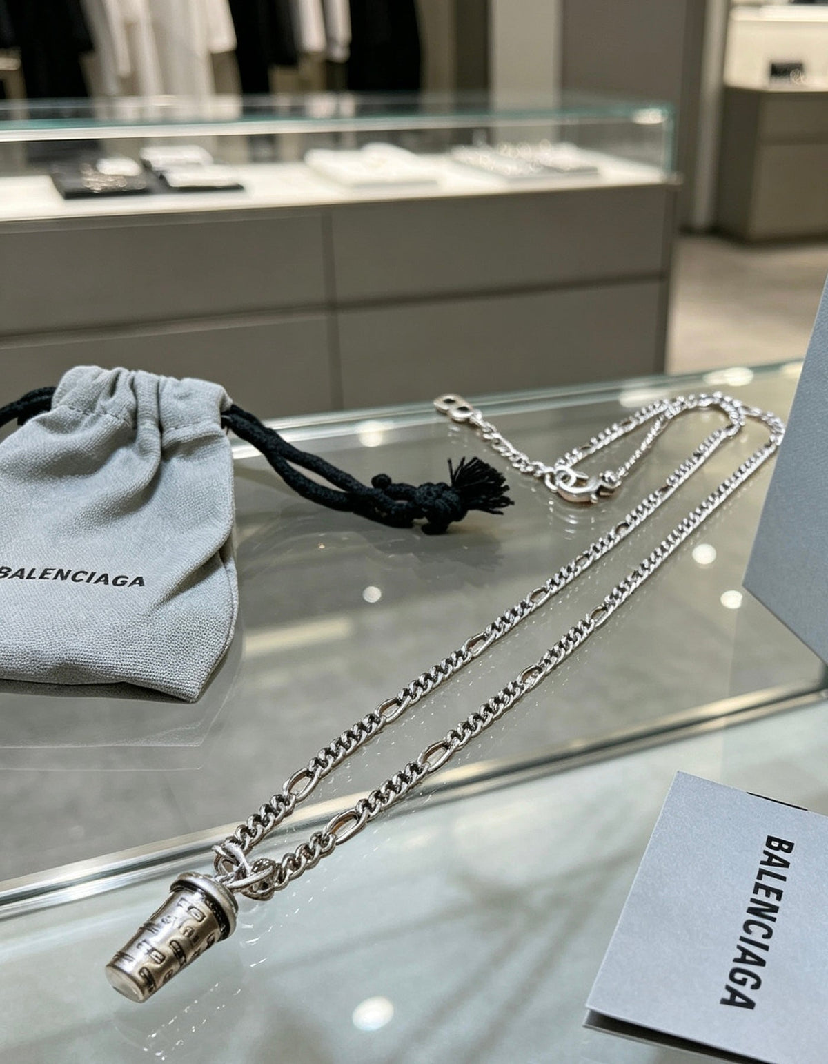 Martin Graham pendant necklace in polished metal-tone – close-up detail