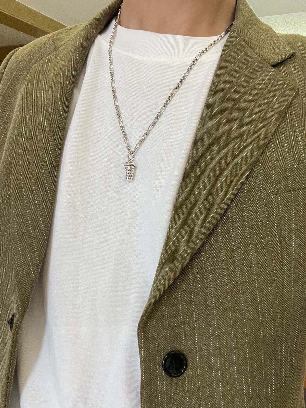 Martin Graham pendant necklace in polished metal-tone – styled product view
