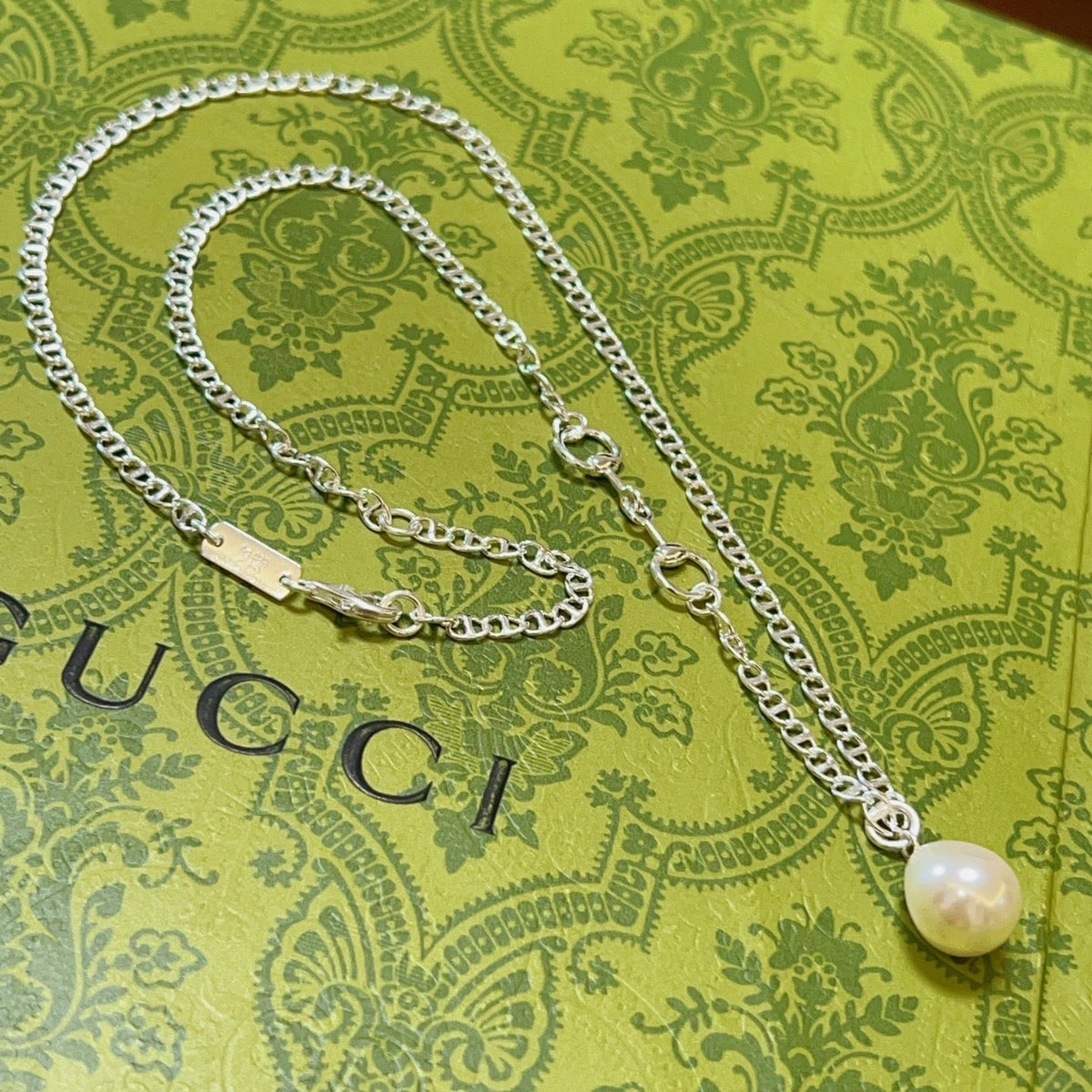 Martin Graham pendant necklace in polished metal-tone – front product view