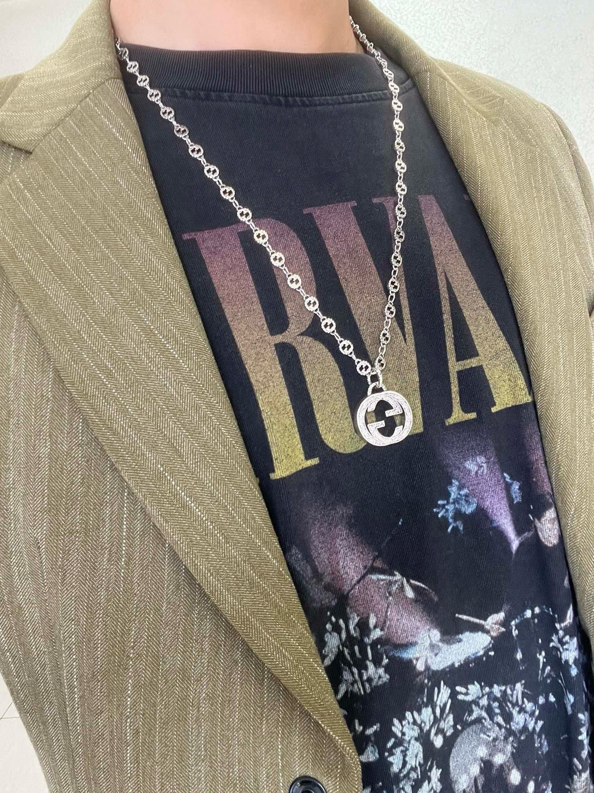 Martin Graham pendant necklace in polished metal-tone – detail view