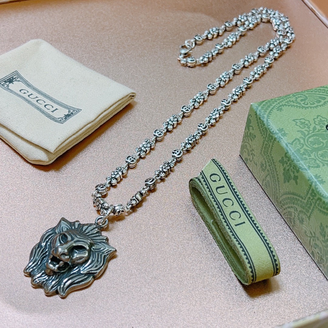 Martin Graham pendant necklace in polished metal-tone – detail view