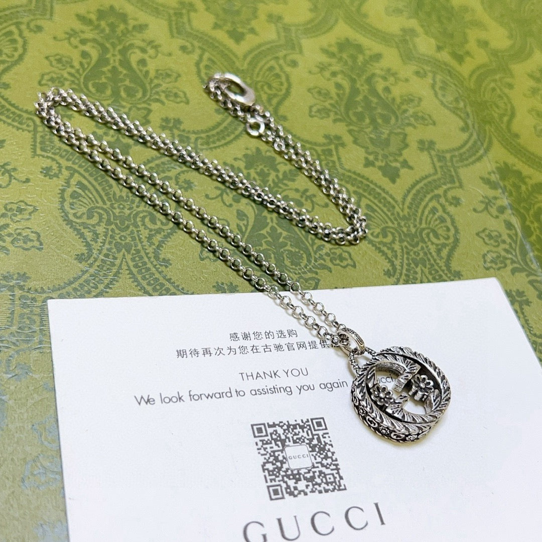 Martin Graham pendant necklace in polished metal-tone – front product view