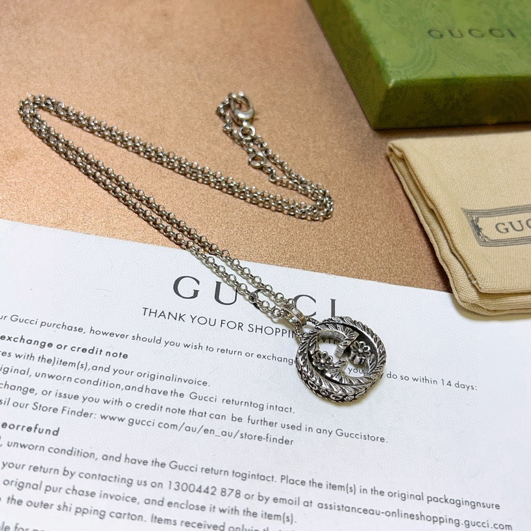 Martin Graham pendant necklace in polished metal-tone – front product view