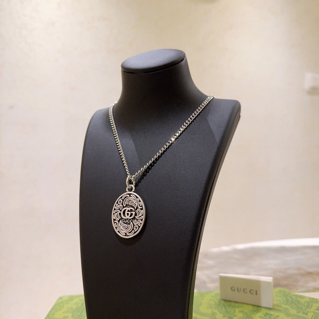 Martin Graham pendant necklace in polished metal-tone – front product view
