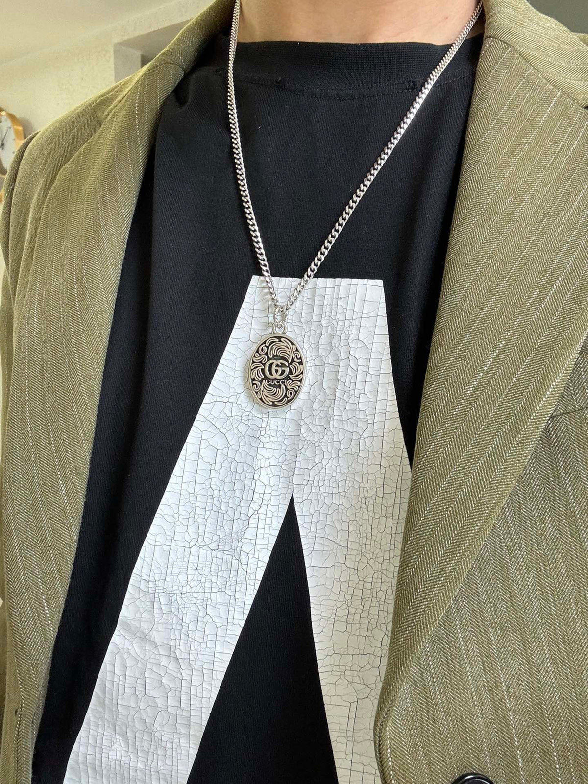Martin Graham pendant necklace in polished metal-tone – styled product view