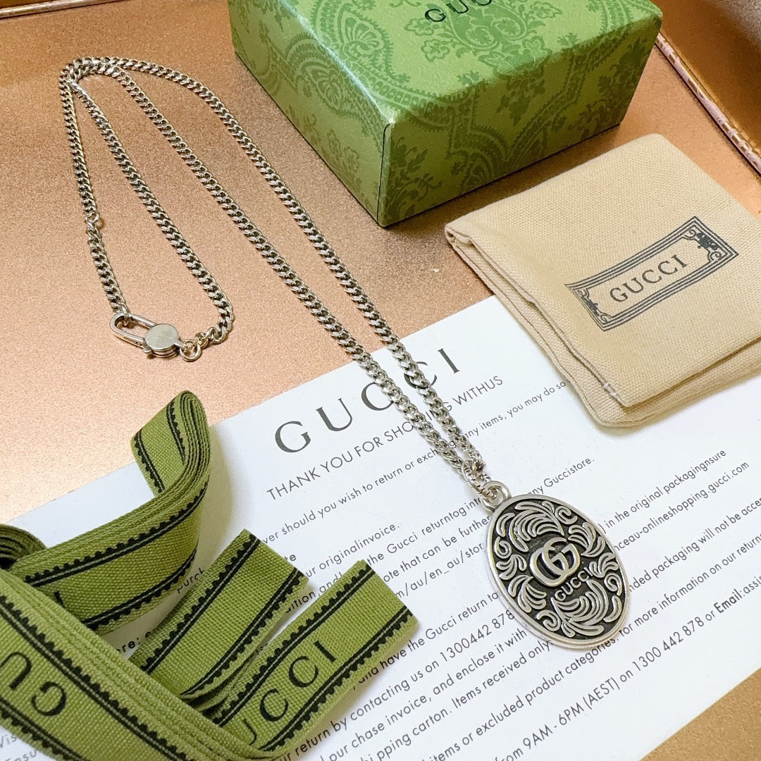 Martin Graham pendant necklace in polished metal-tone – main product view