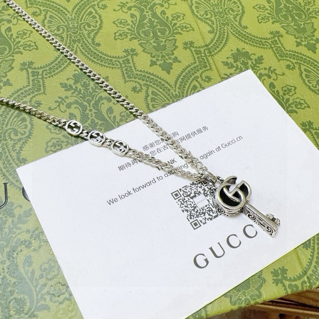Martin Graham pendant necklace in polished metal-tone – main product view