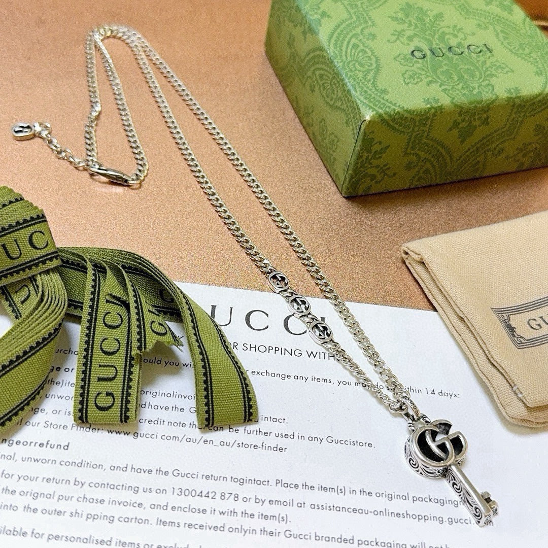Martin Graham pendant necklace in polished metal-tone – front product view