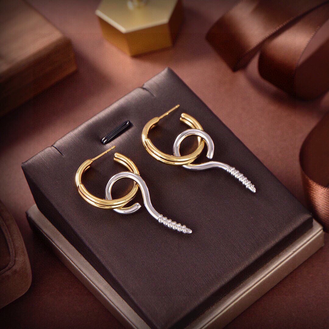Martin Graham earrings in polished metal-tone – front product view
