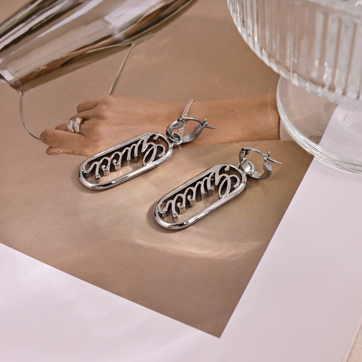 Martin Graham stud earrings in polished metal-tone – main product view