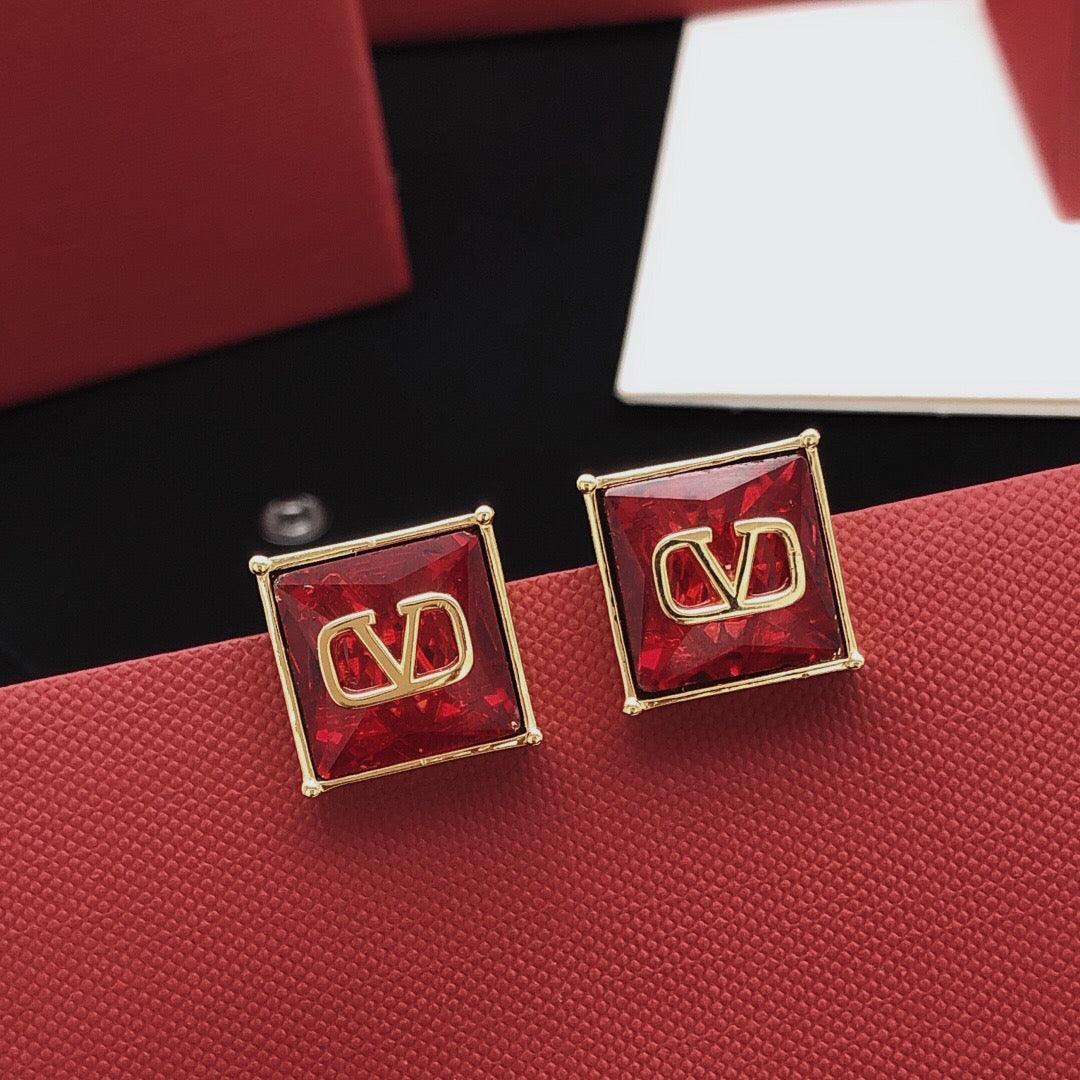 Martin Graham stud earrings in polished metal-tone – main product view