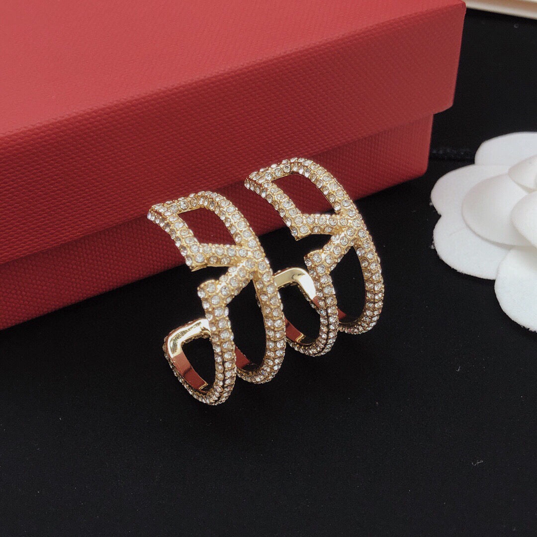 Martin Graham earrings in polished metal-tone – side detail