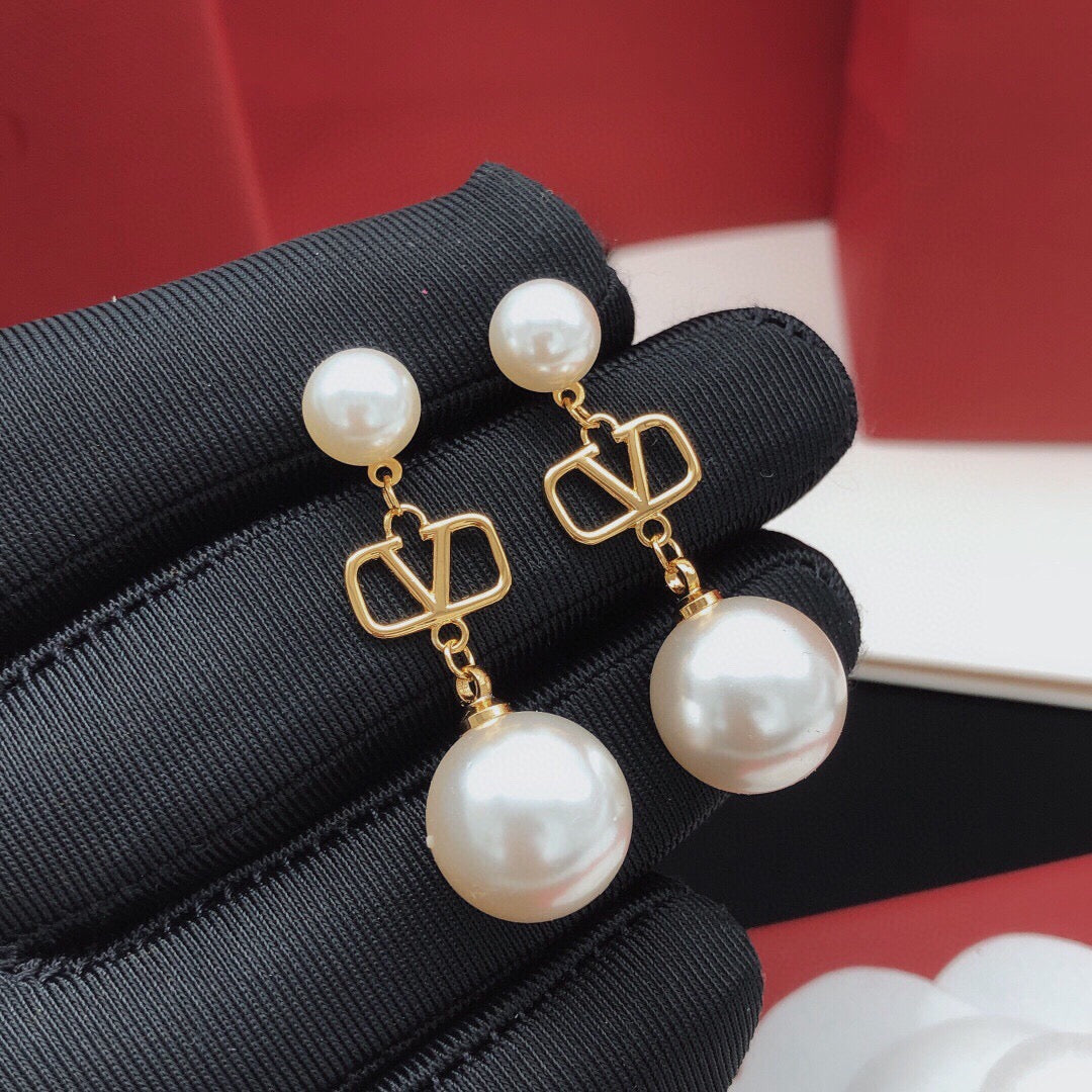 Martin Graham stud earrings in polished metal-tone – main product view