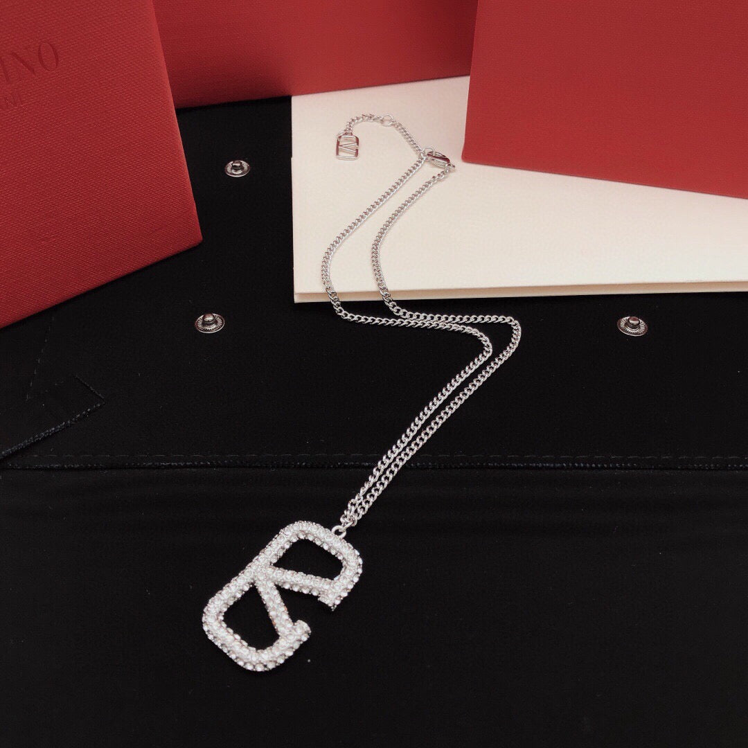 Martin Graham pendant necklace in polished metal-tone