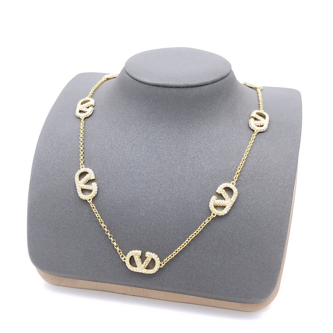 Martin Graham pendant necklace in polished metal-tone