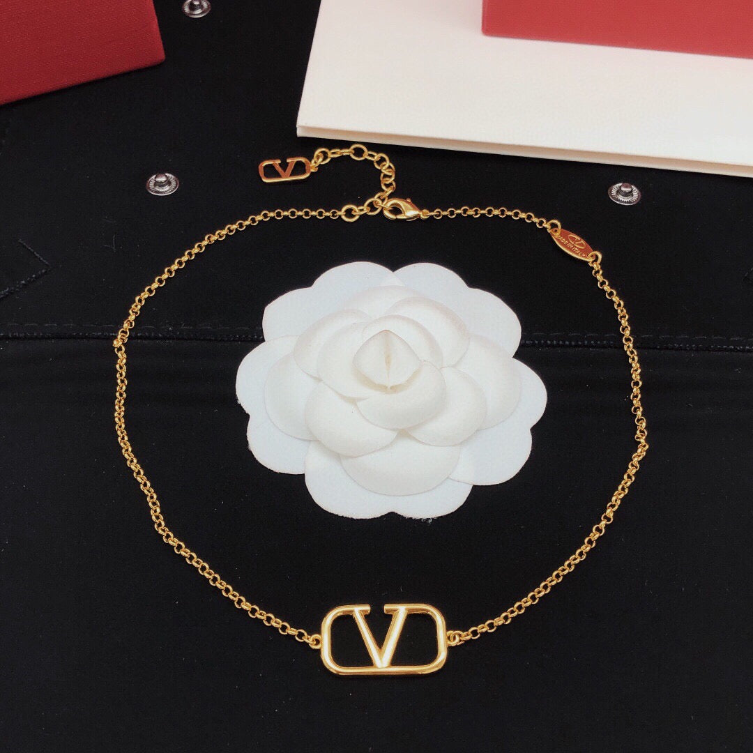 Martin Graham pendant necklace in polished metal-tone