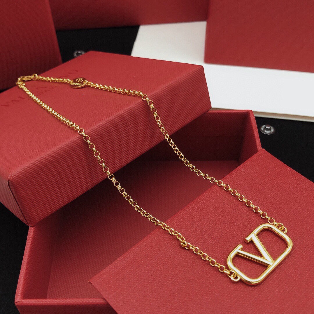Martin Graham pendant necklace in polished metal-tone – front view