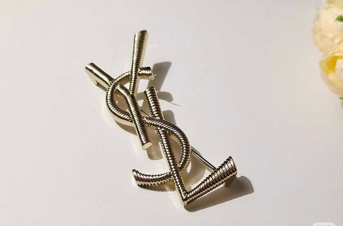 Martin Graham brooch in polished metal-tone – close-up detail