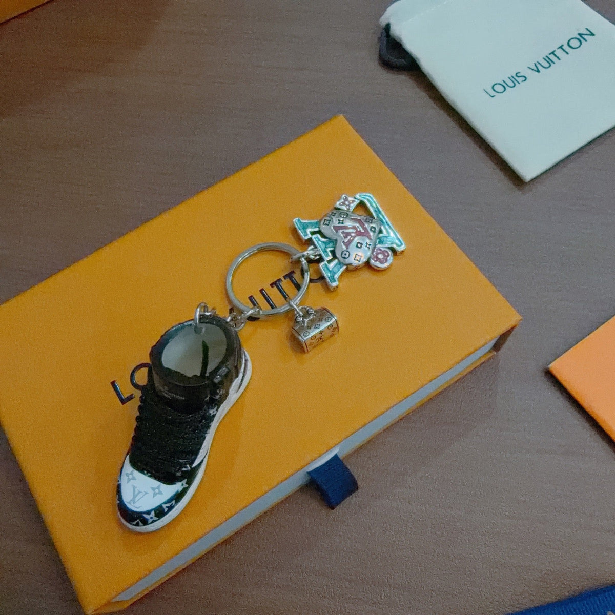 Martin Graham keychain in polished metal-tone – detail view