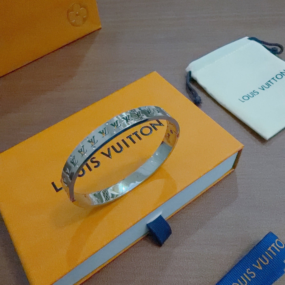 Martin Graham bangle in polished metal-tone – styled product view