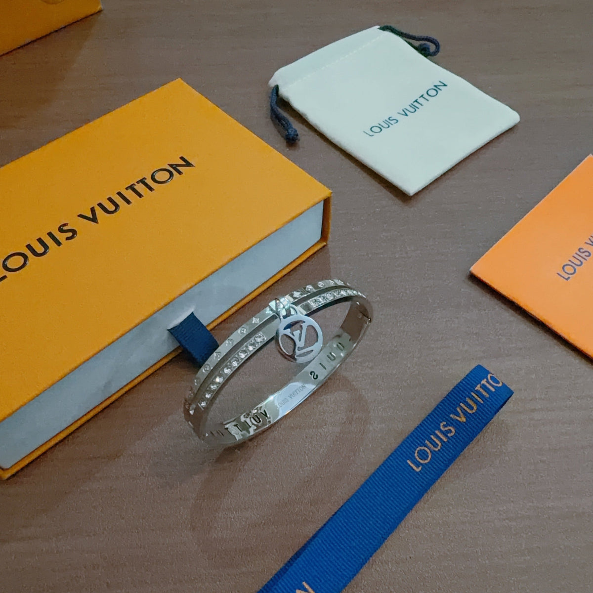Martin Graham bangle in polished metal-tone – front product view