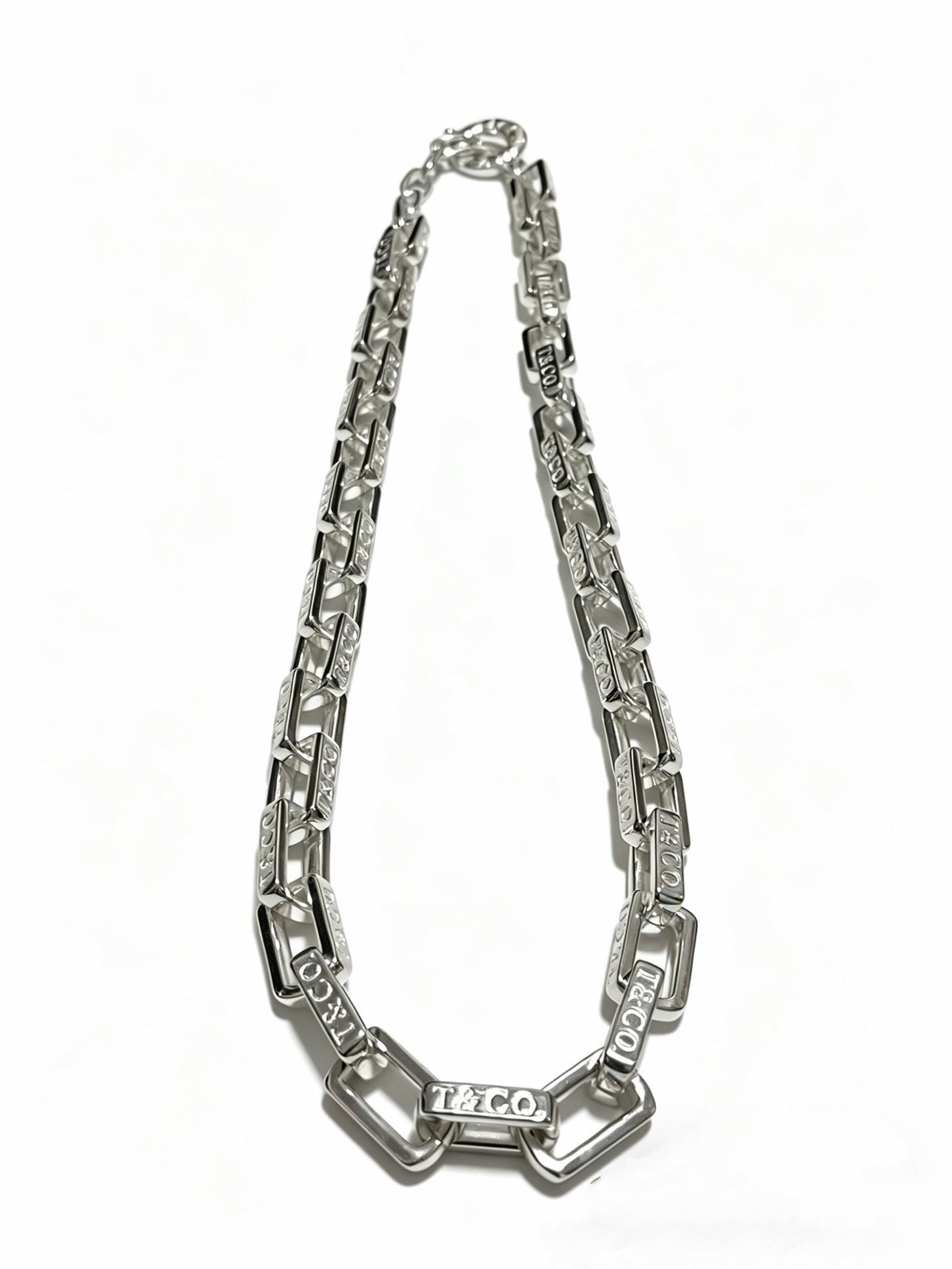 Martin Graham pendant necklace in polished metal-tone – detail view