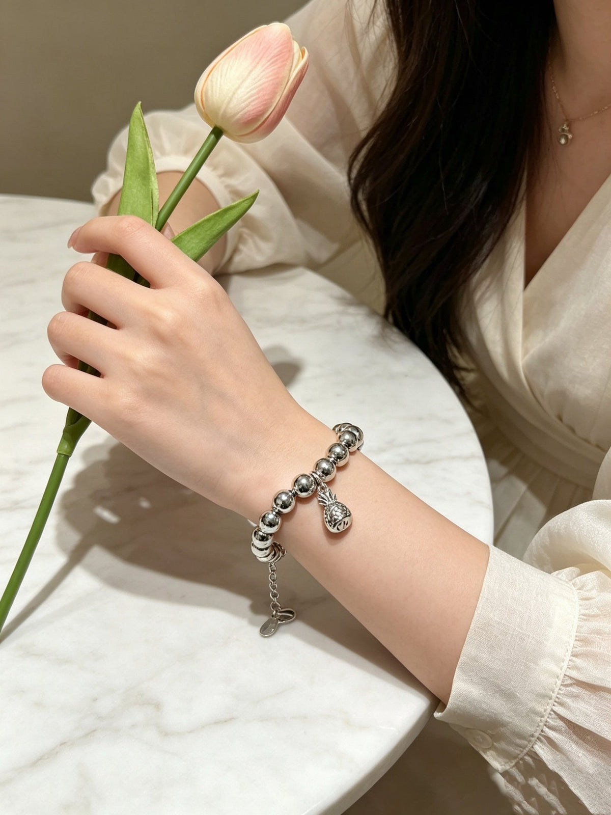 Martin Graham bracelet in polished metal-tone – close-up detail