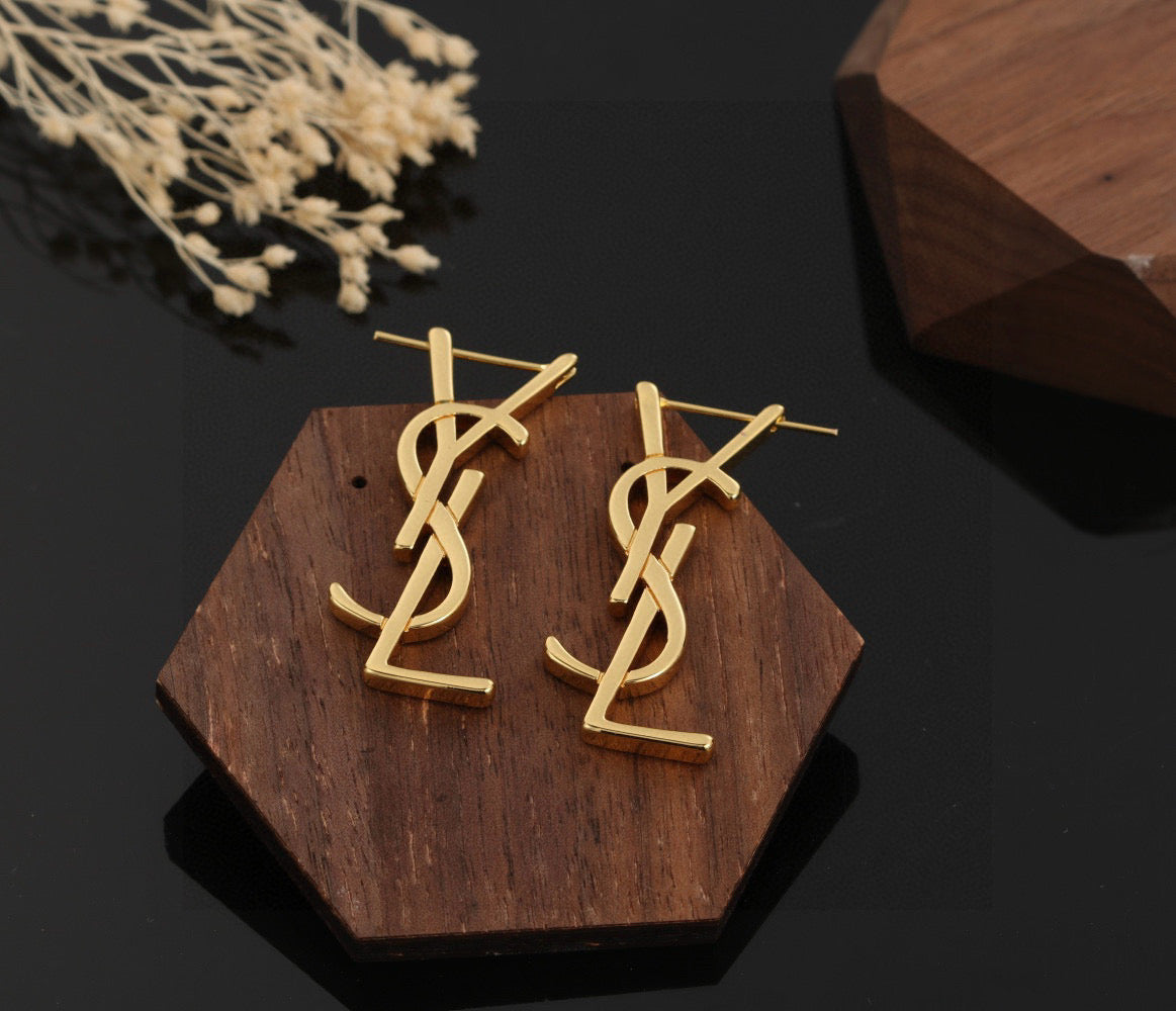 Martin Graham stud earrings in polished metal-tone – detail view