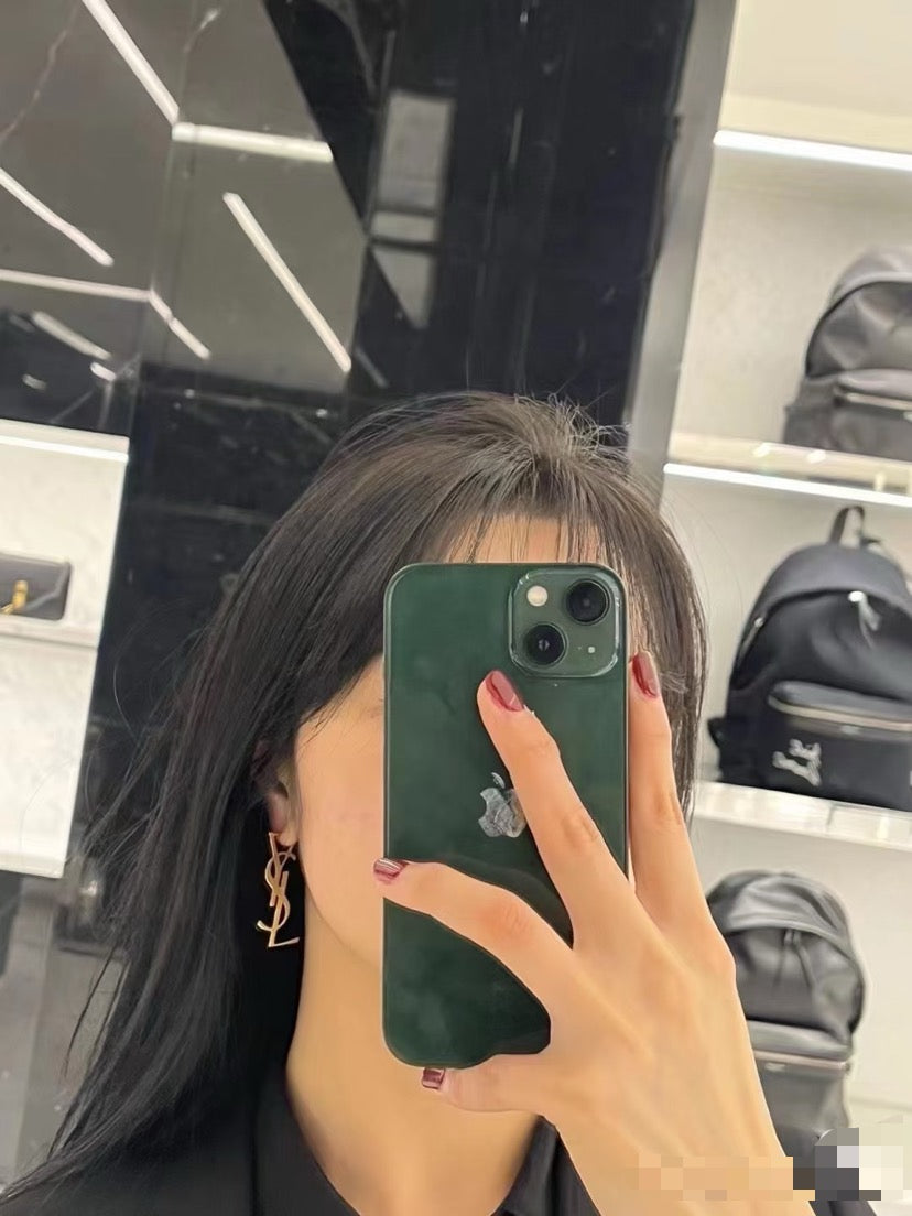 Martin Graham stud earrings in polished metal-tone – styled product view