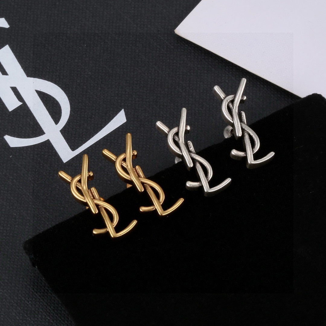 Martin Graham stud earrings in polished metal-tone – side detail