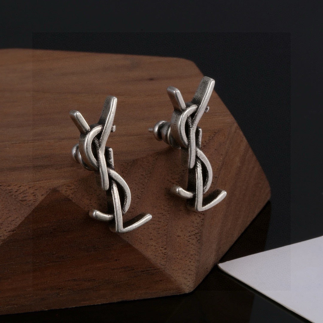 Martin Graham stud earrings in polished metal-tone – front product view