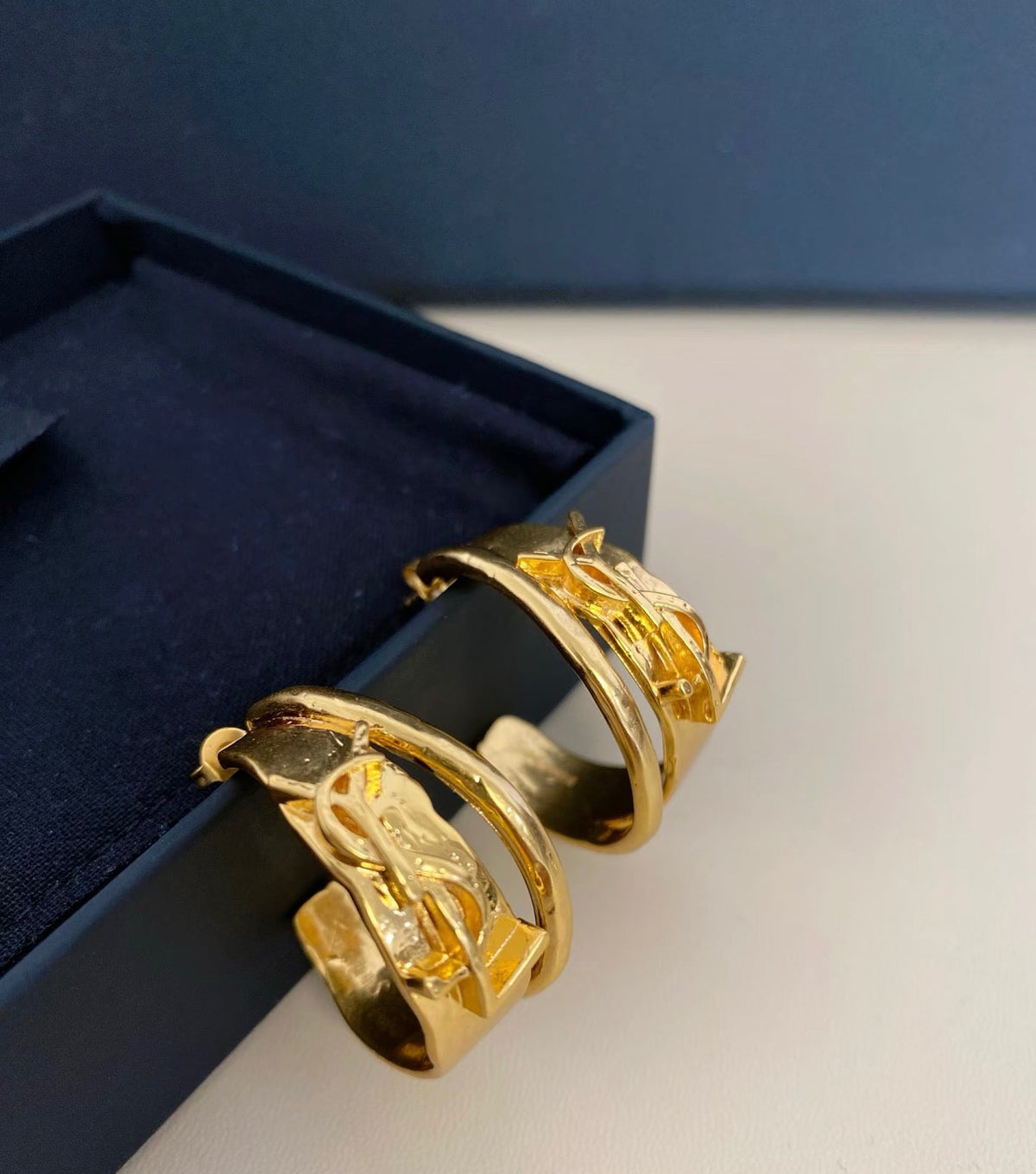 Martin Graham earrings in polished metal-tone – side detail
