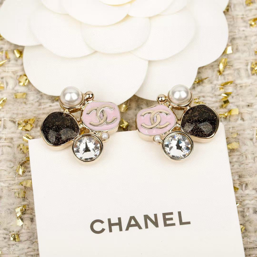 Martin Graham stud earrings in polished metal-tone – detail view
