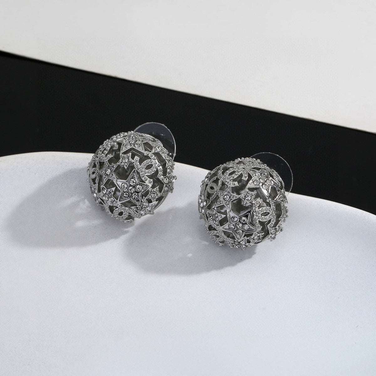 Martin Graham stud earrings in polished metal-tone – main product view