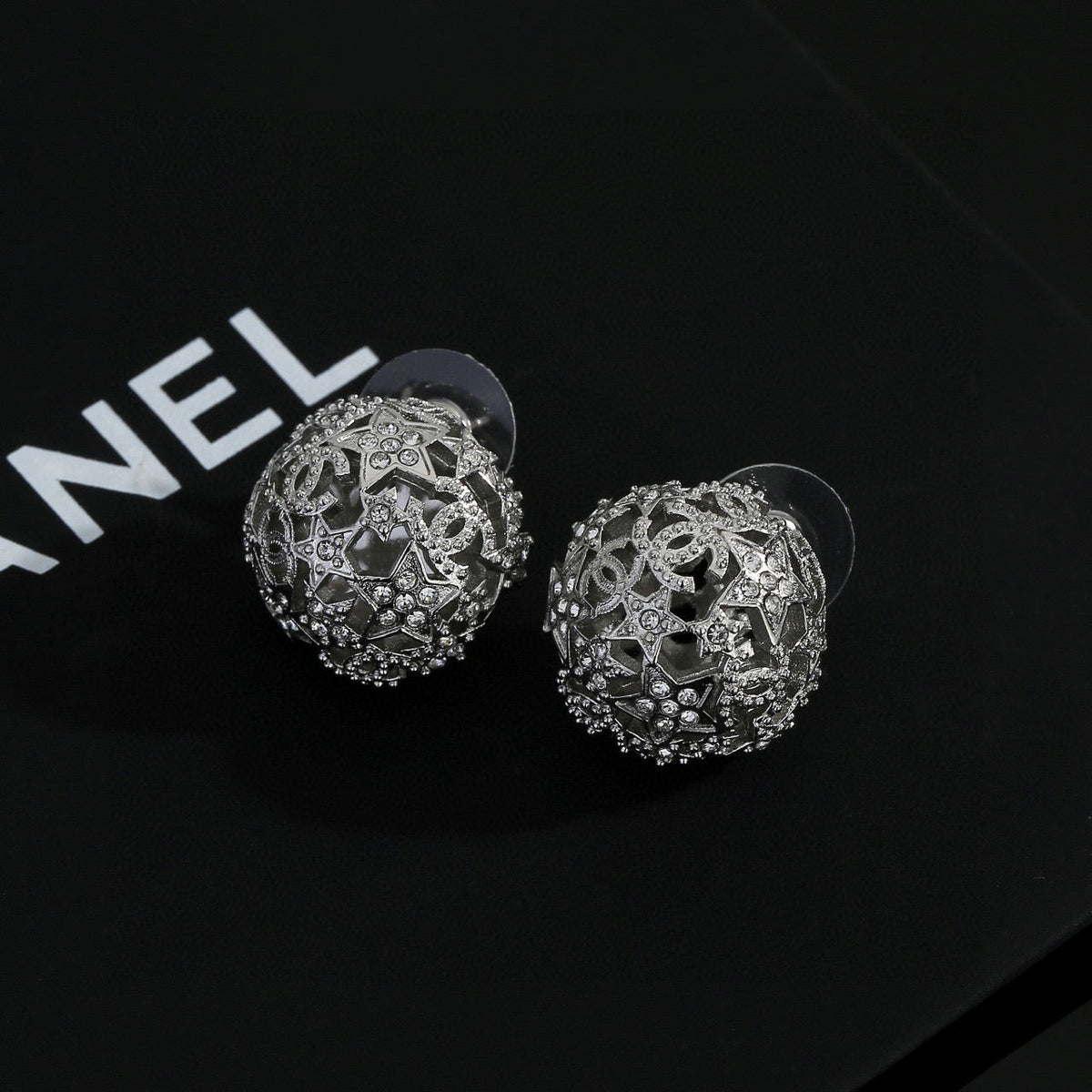Martin Graham stud earrings in polished metal-tone – front product view