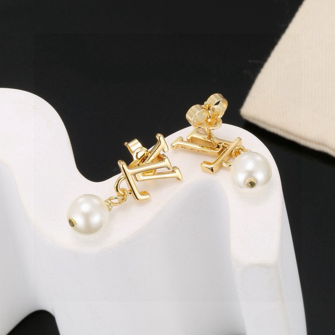 Martin Graham stud earrings in polished metal-tone – main product view
