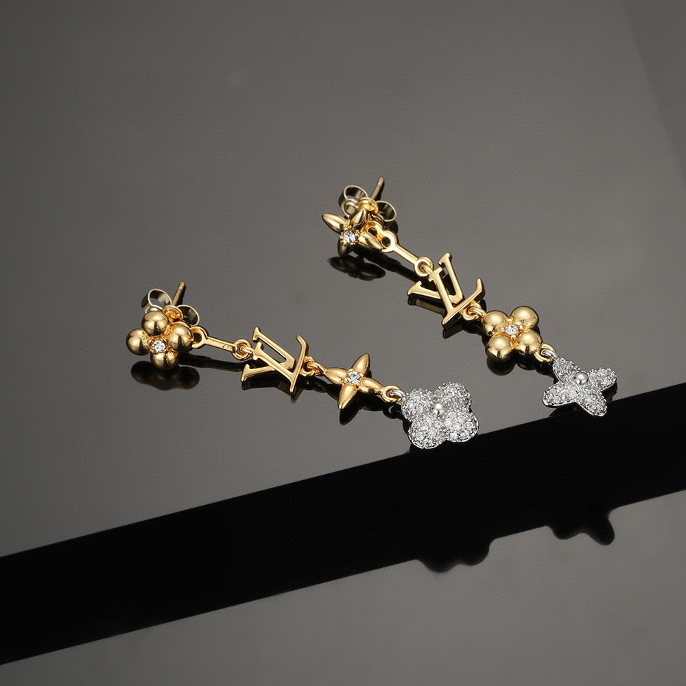 Martin Graham stud earrings in polished metal-tone – front product view