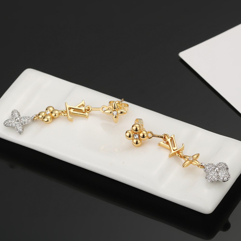 Martin Graham stud earrings in polished metal-tone – front product view