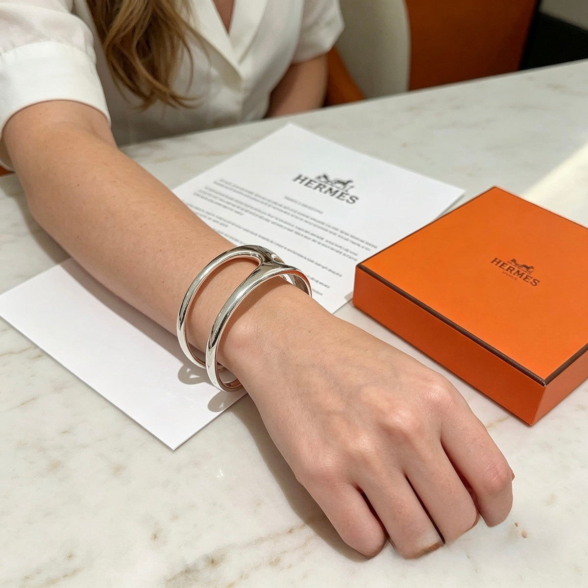 Martin Graham bangle in polished metal-tone – side detail